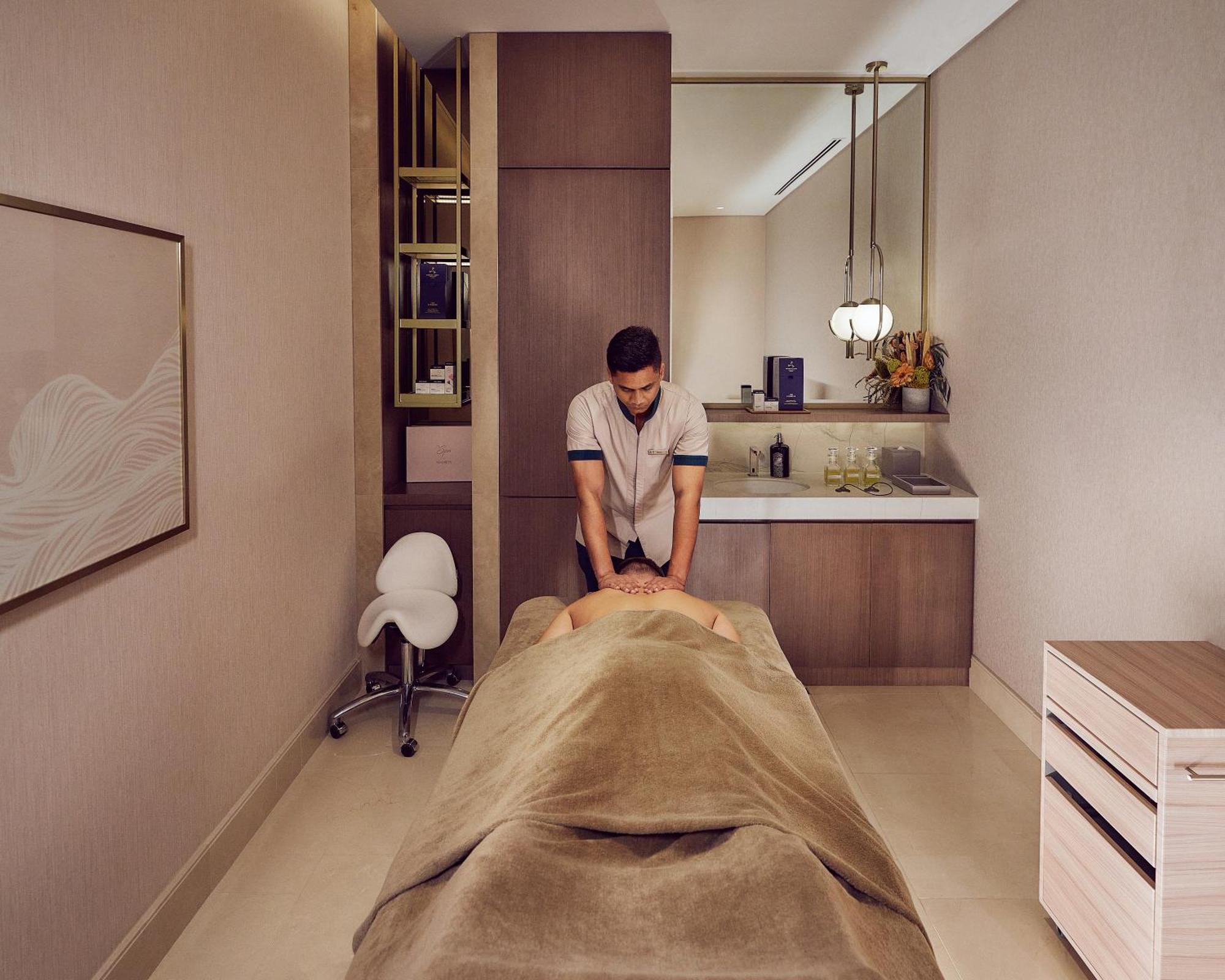 Address Beach Resort Bahrain Manama Exterior photo A massage therapist at work