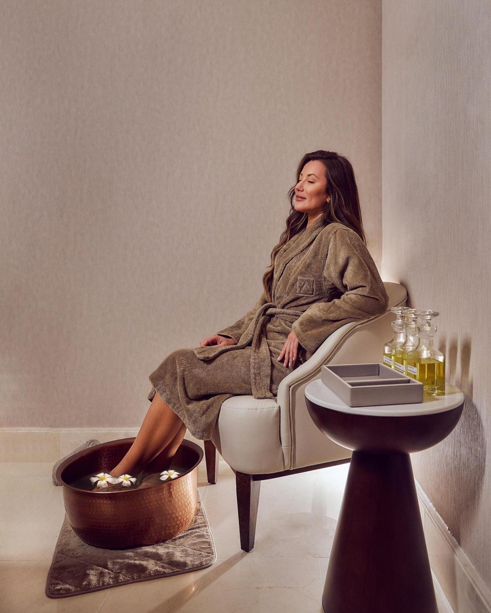 Address Beach Resort Bahrain Manama Exterior photo A woman relaxing at a spa